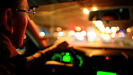 Man driving at night