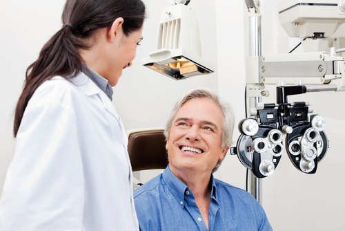 Eye Doctor discussing an eye exam with a patient