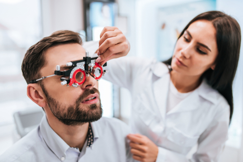 Young man receiving and eye exam