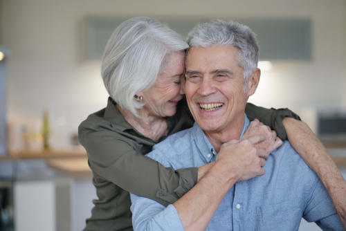 Seniors hugging