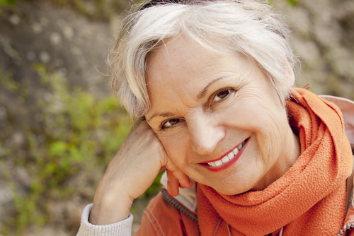 Older woman smiling with cataracts
