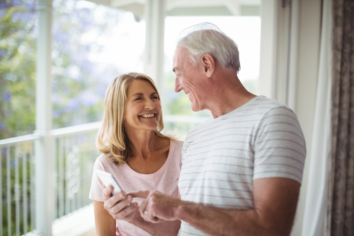 older couple looking at cell phone